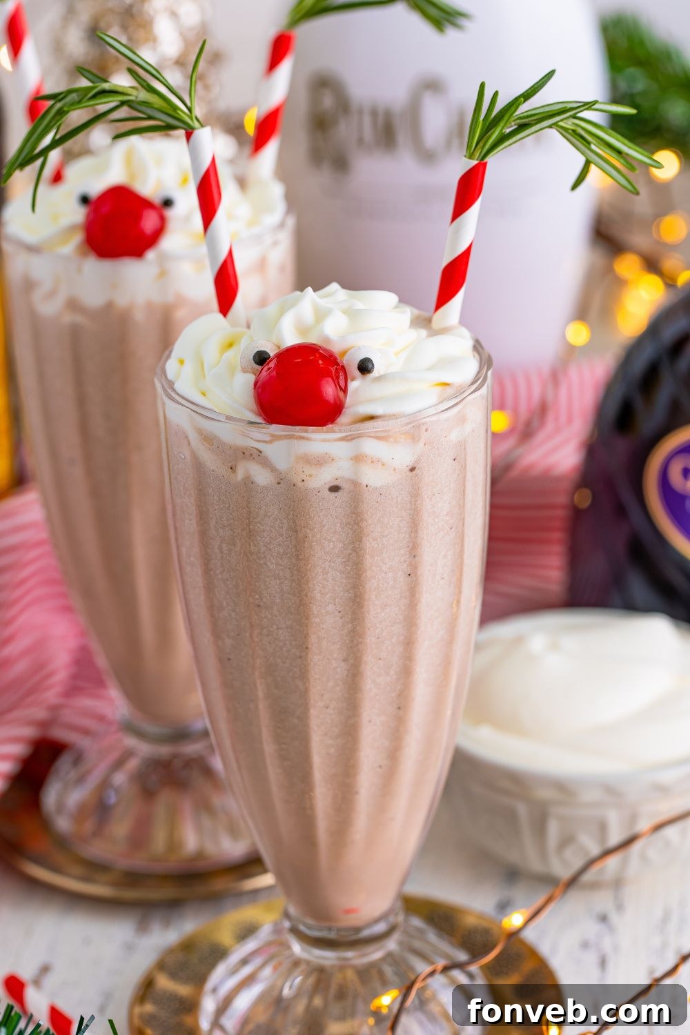 Festive Christmas milkshakes, decorated and ready for serving in elegant glasses.