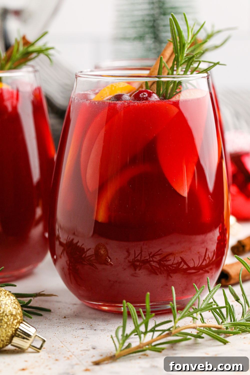 Multiple glasses of sangria on a festive table setting.