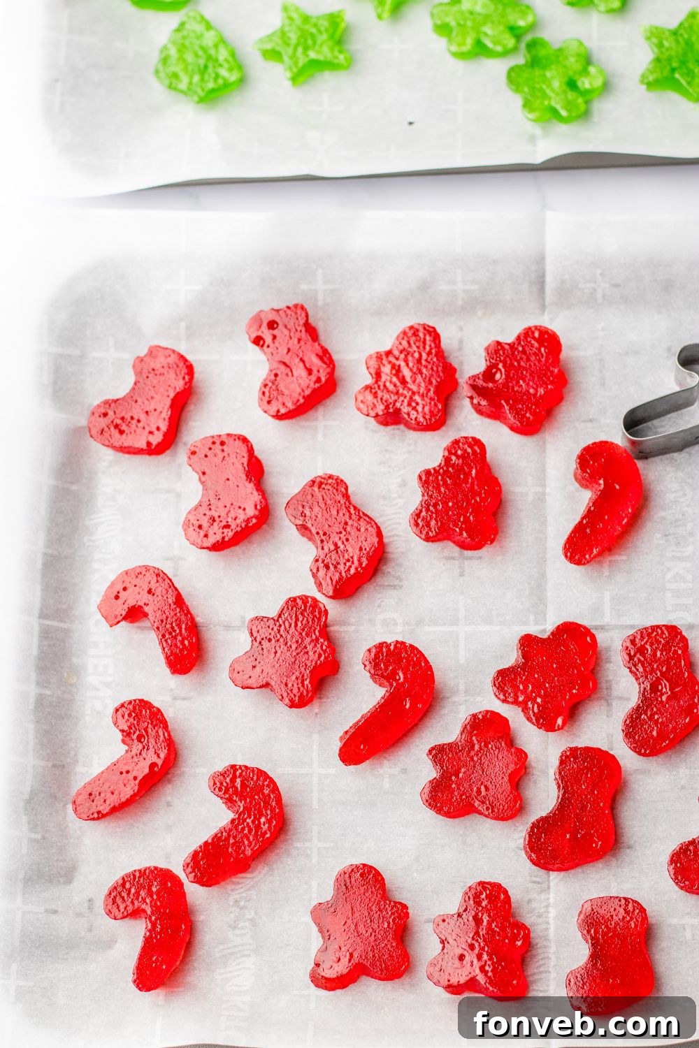 Yuletide Jewels 12 Cookie-cutter homemade gummies on a table