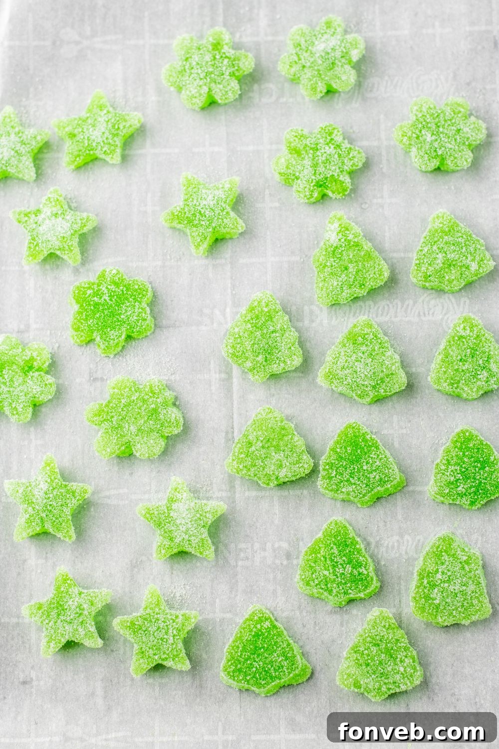 Yuletide Jewels 13 Gummies rolled in sugar on parchment paper