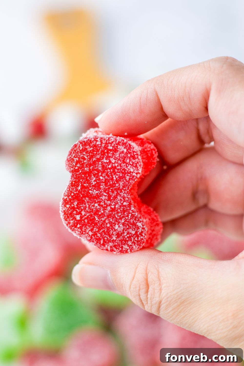 Yuletide Jewels 20 Holding a Christmas gumdrop