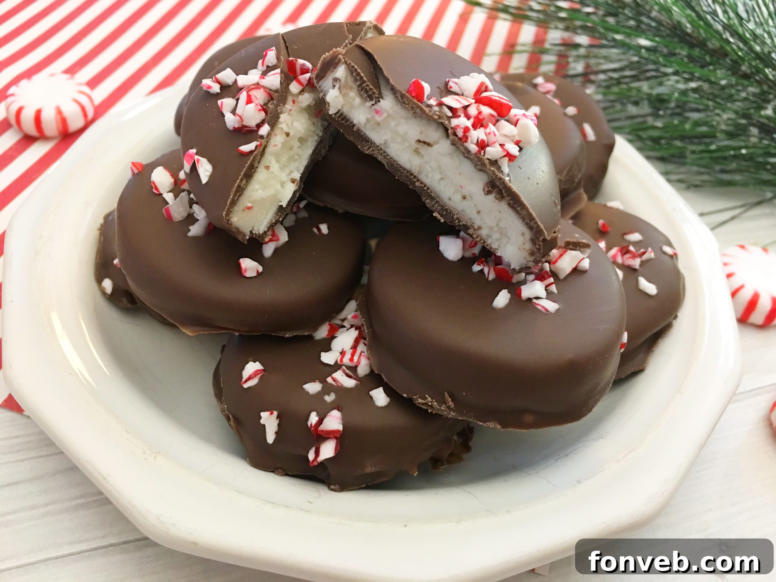 Easy Homemade Peppermint Patties 11 Finished peppermint patties topped with nuts and crushed peppermint
