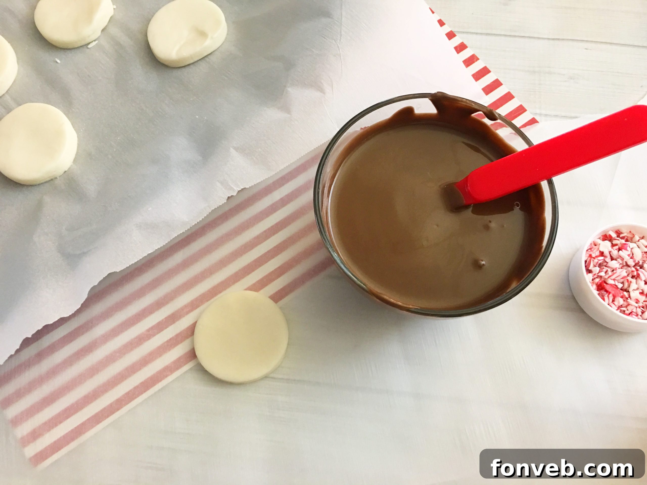 Easy Homemade Peppermint Patties 7 Homemade peppermint patties cooling on parchment paper