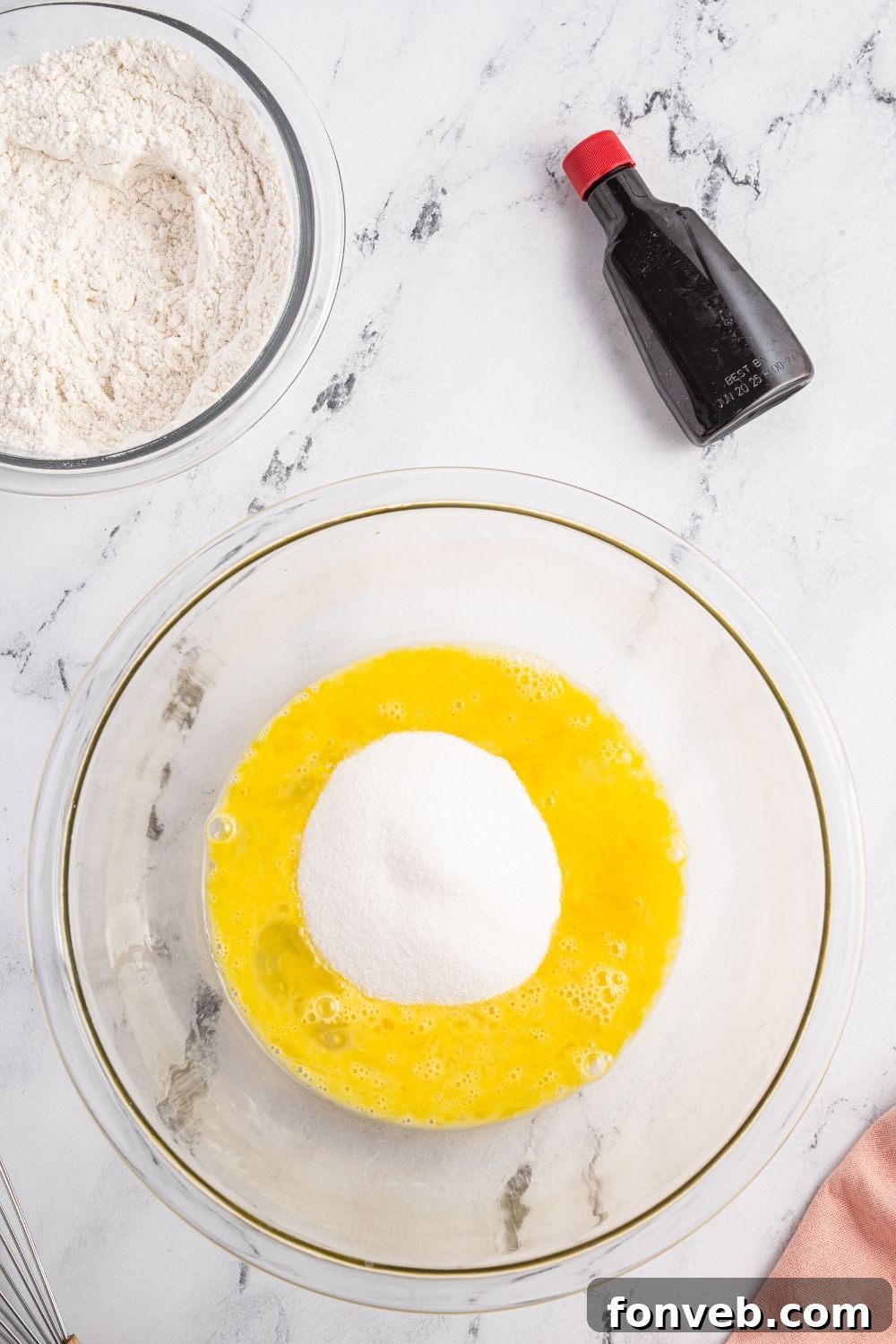 eggs and sugar in a bowl 