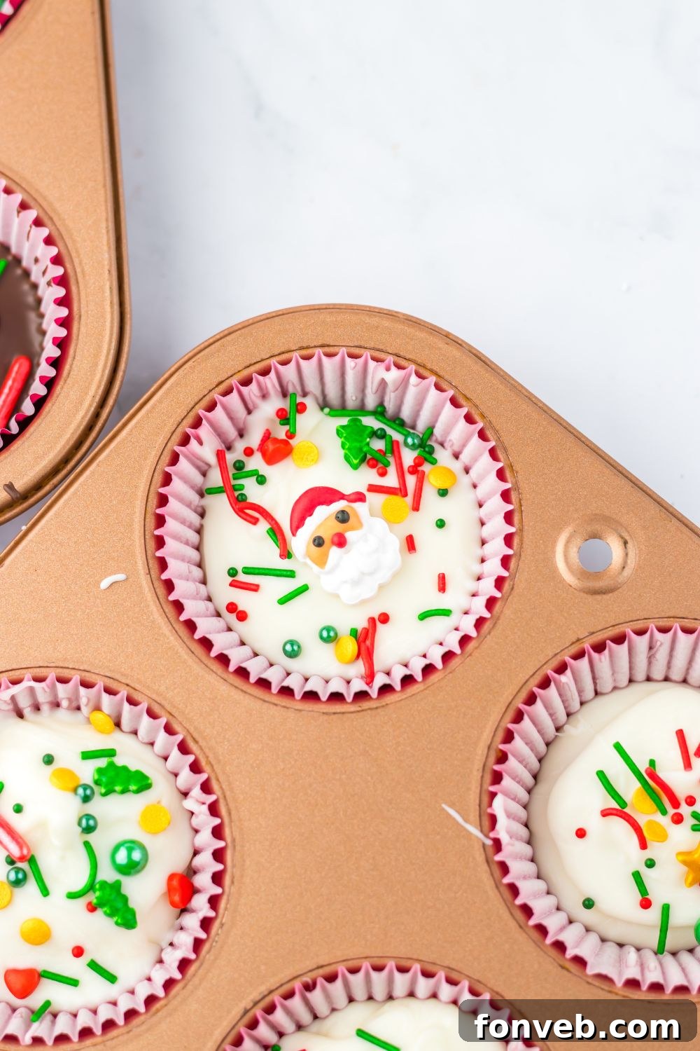 sprinkels on top of white chocoalte peanut butter cups 