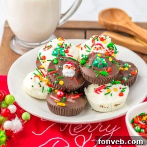 Christmas Peanut Butter Cups on a plate with a glass of milk in the background