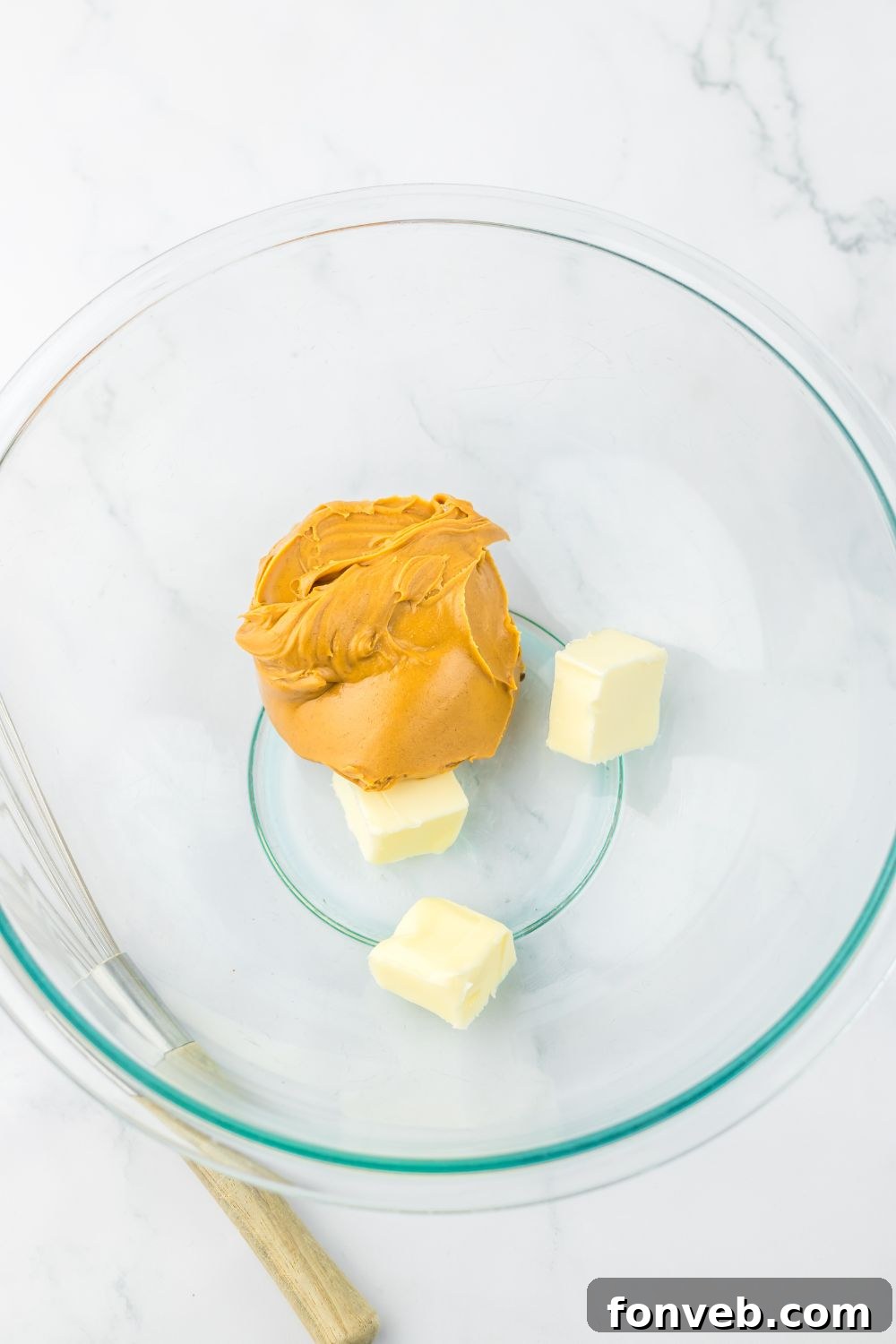 peanut butter and butter in a glass bowl 