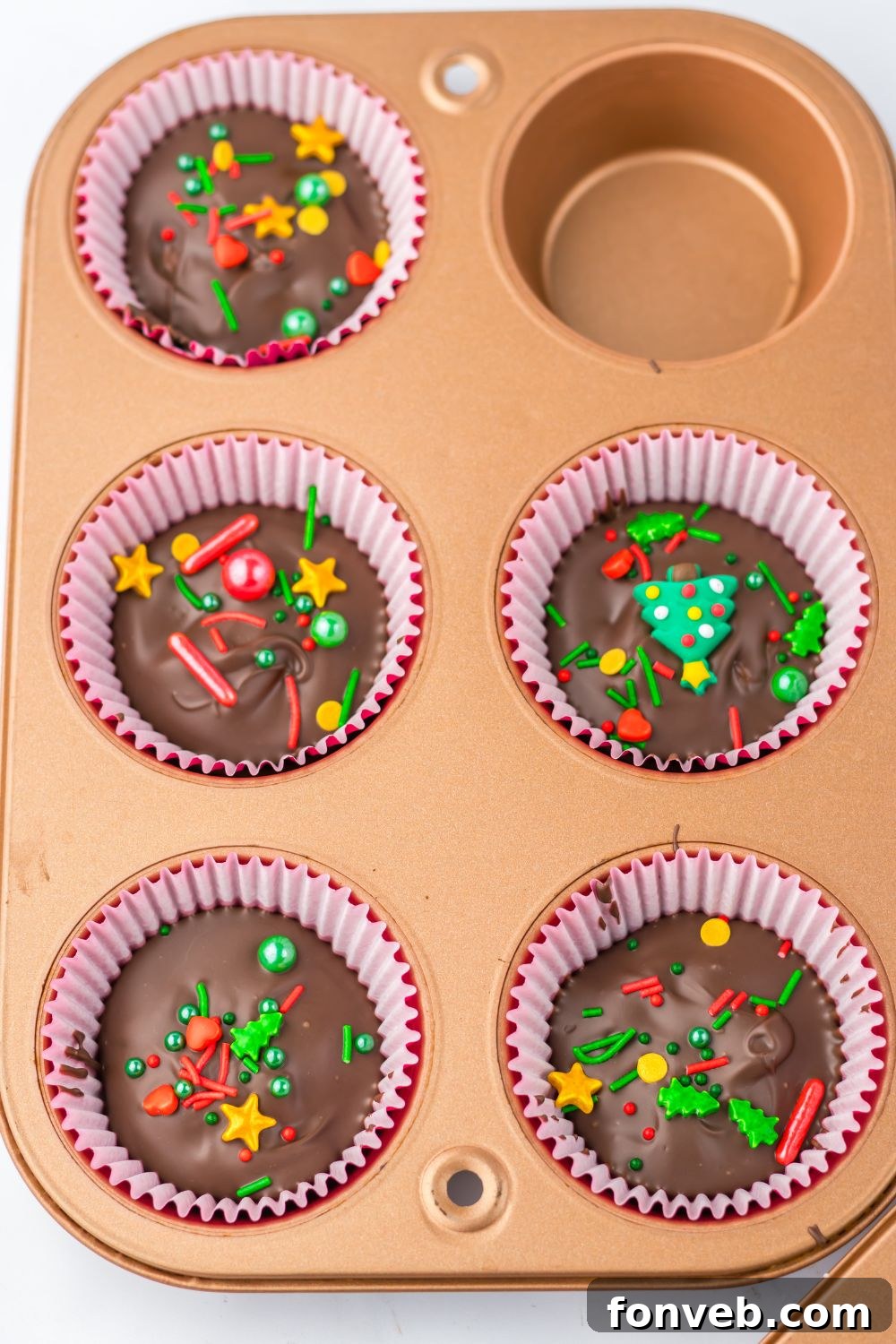 homemade reese cups in a muffin tin 