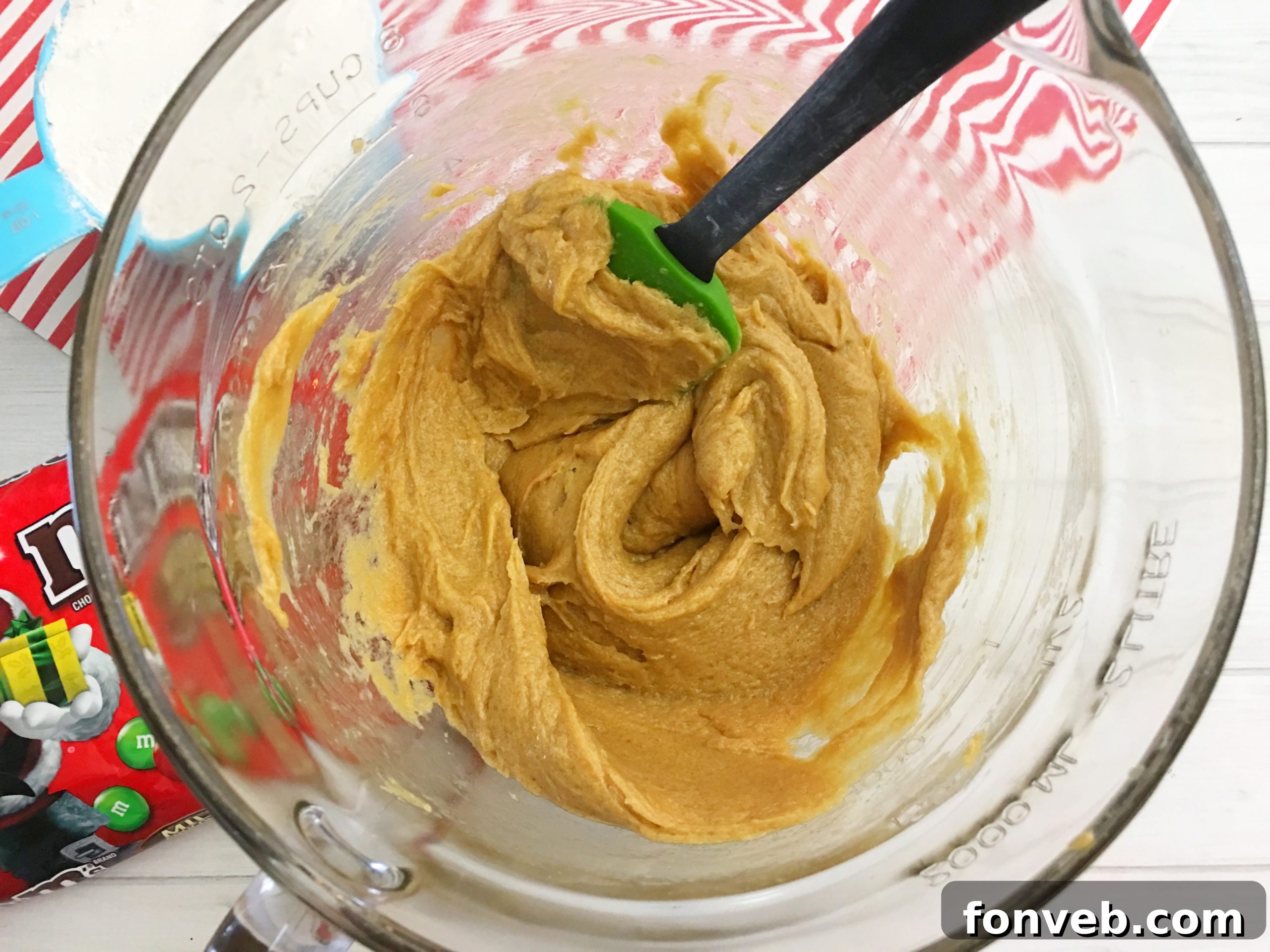 M&M cookie bars with festive red and green candies for Christmas