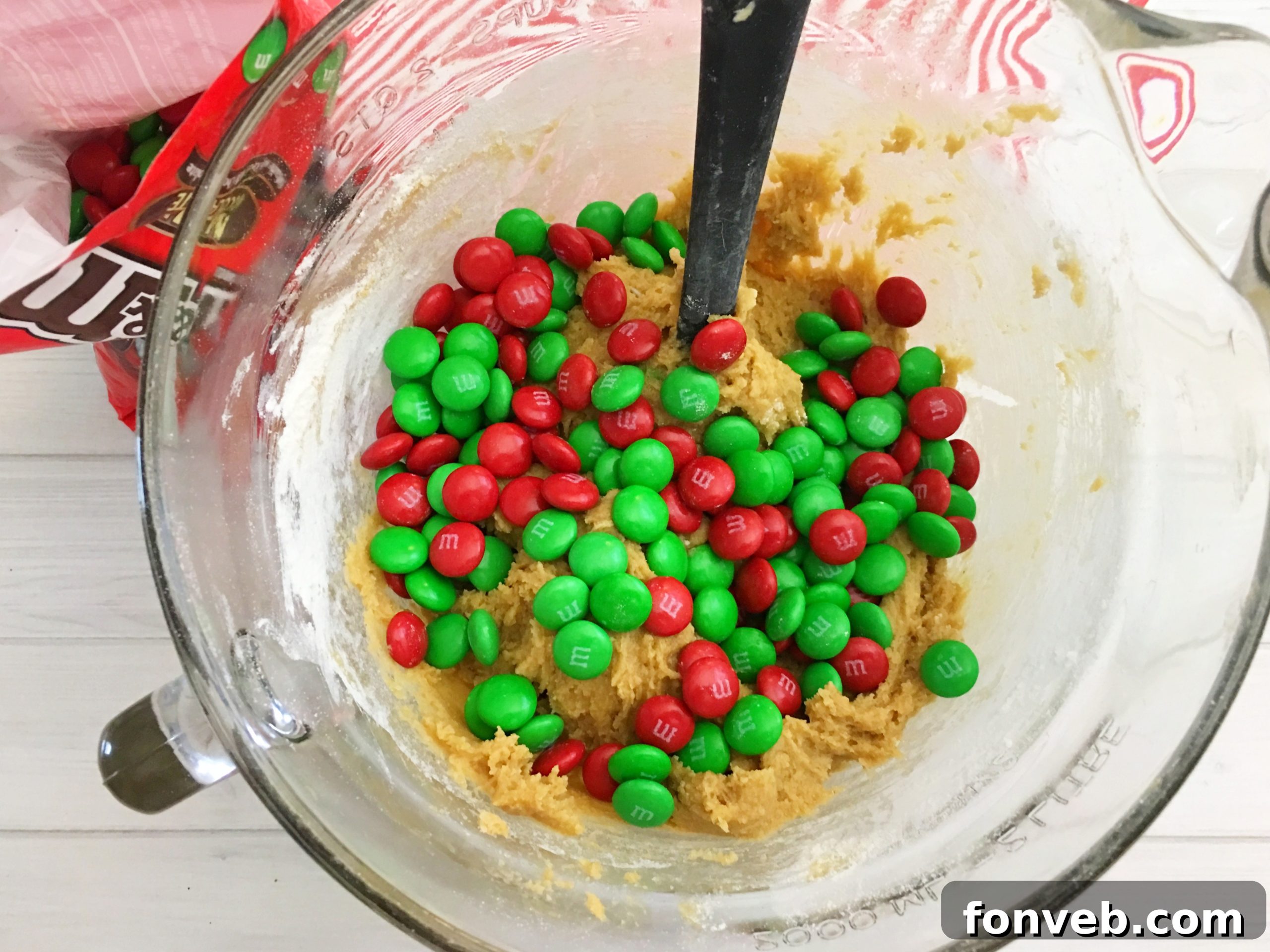 Mixing butter and sugar in a large bowl