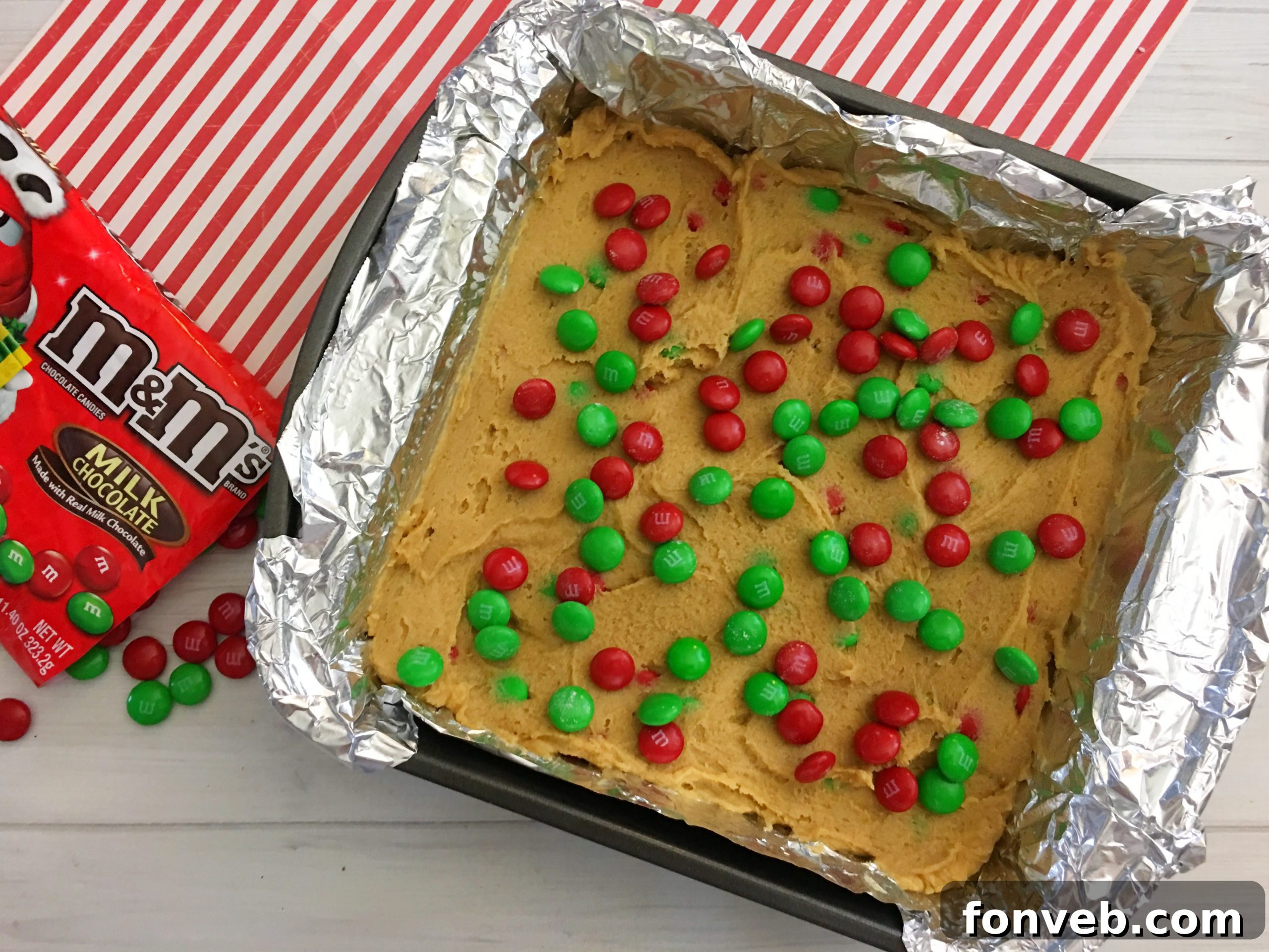 Adding flour to the wet ingredients for cookie dough