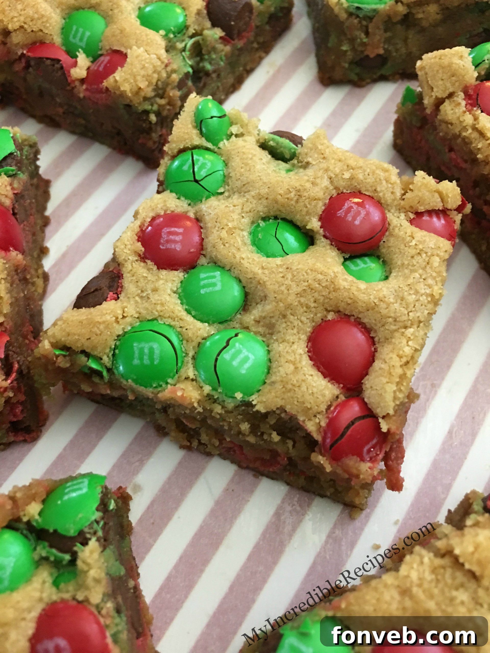 Square M&M cookie bars on a serving plate