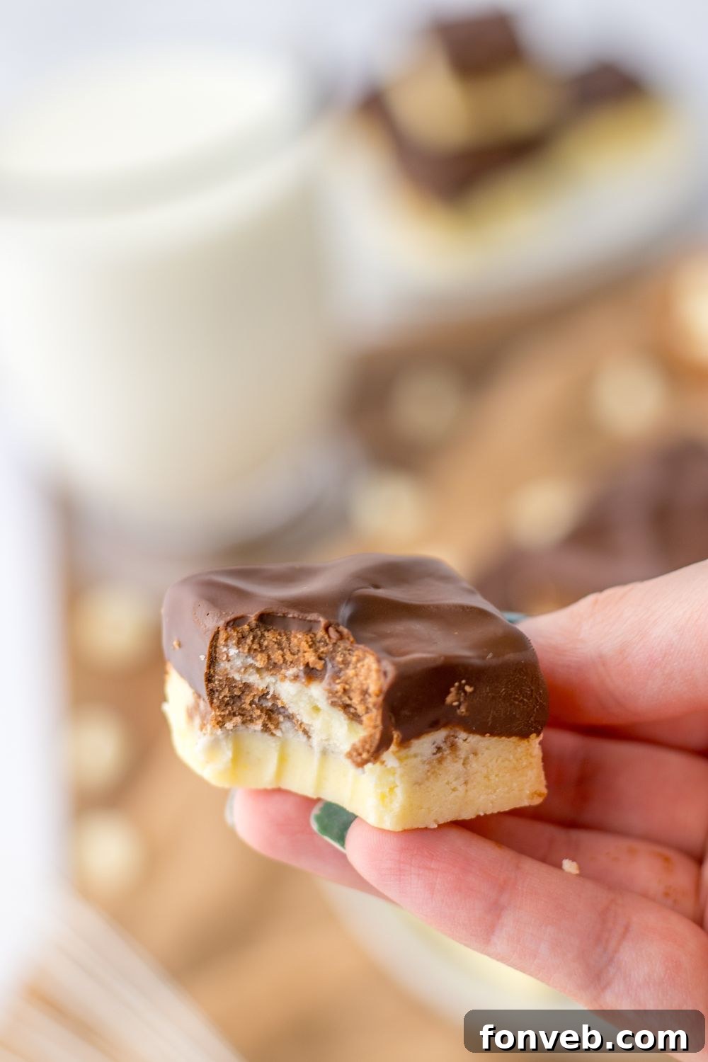 Boston Cream Dream Fudge 12 bite of fudge in hand