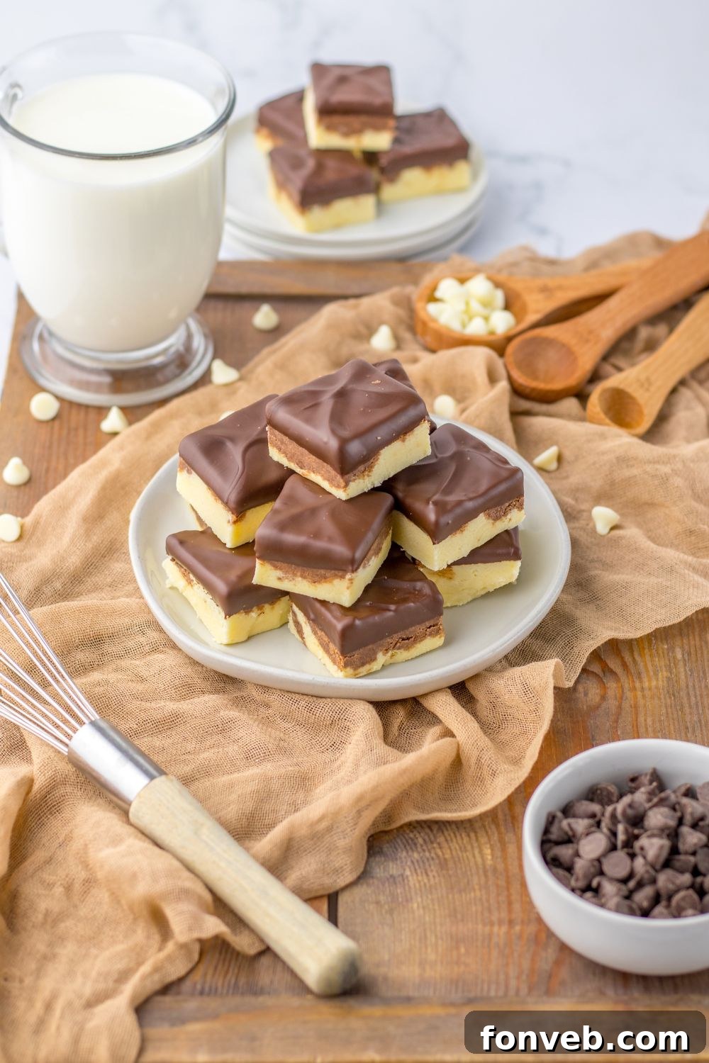 Boston Cream Dream Fudge 19 fudge on table with ingredients around it