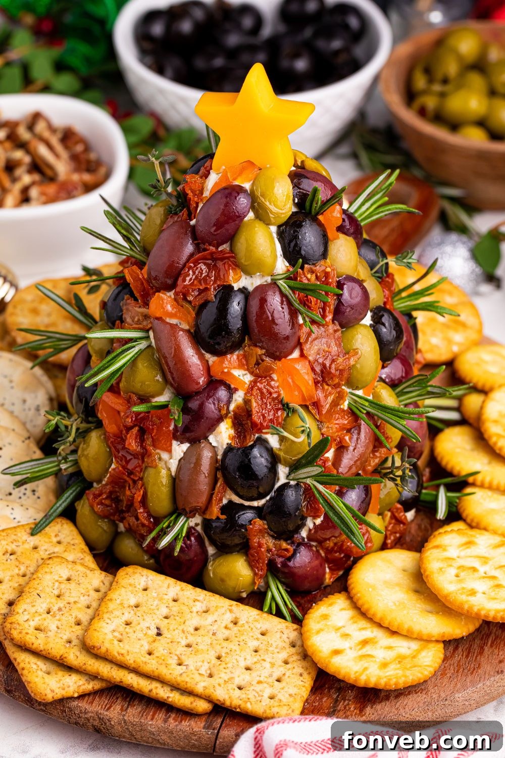 Overhead shot of cheeseball on table, beautifully decorated and ready to be served