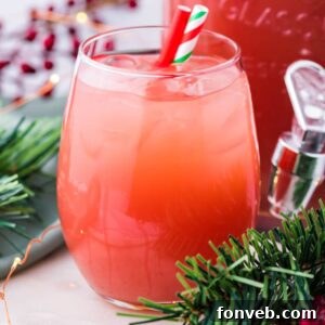 Mistletoe Mix 9 Holiday Punch in glass on table