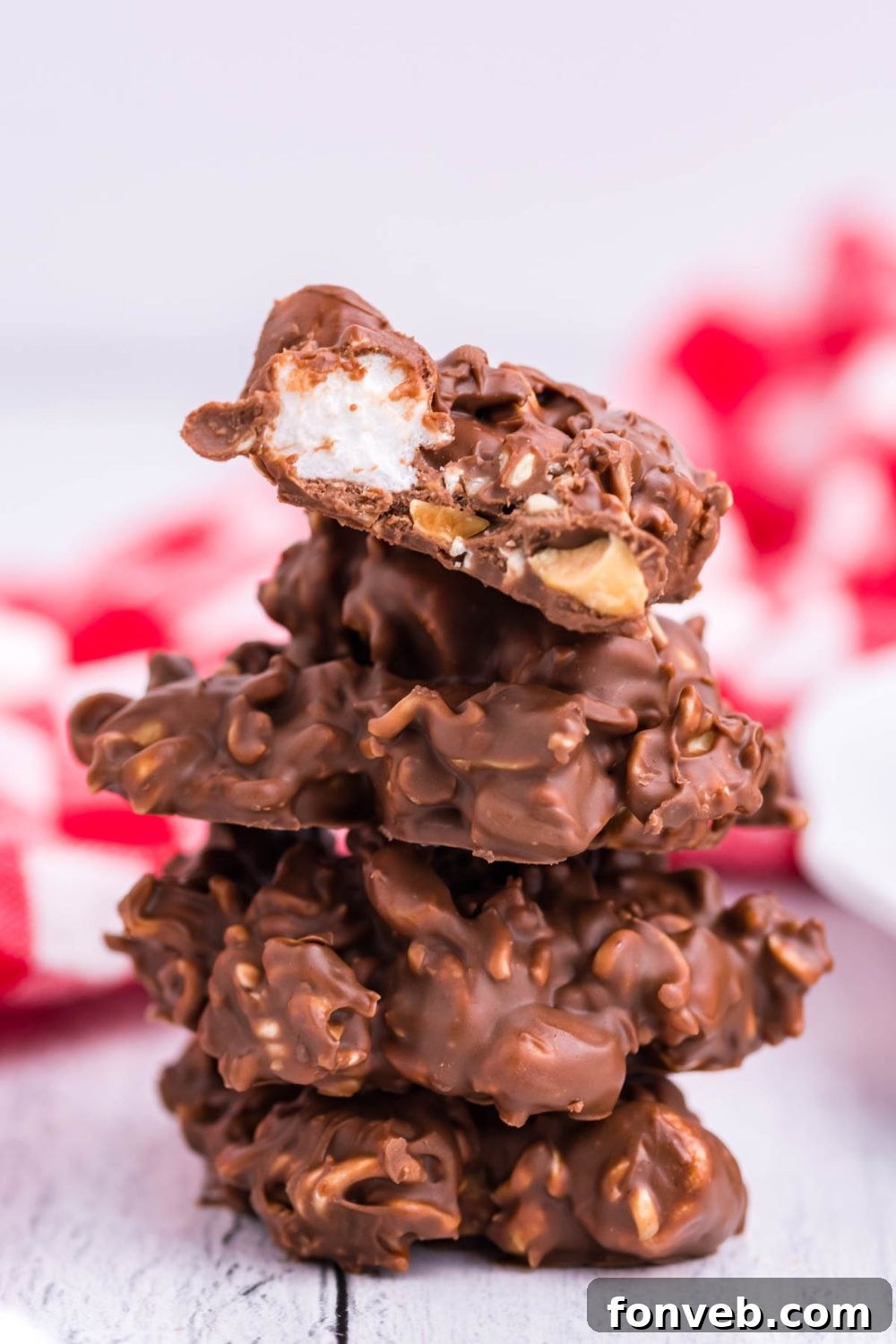 A close-up of a Rocky Road Candy bar, showing its rich texture and ingredients.