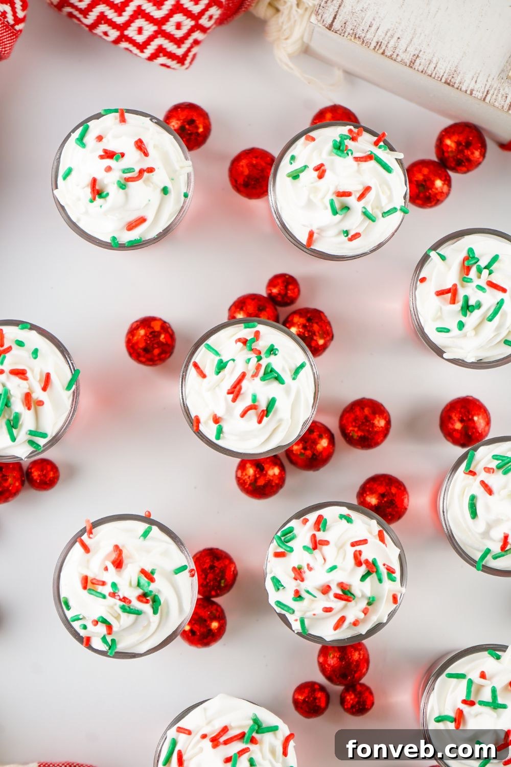 Yuletide Jiggle Shots 13 overhead shot of jello shots with sprinkles on table