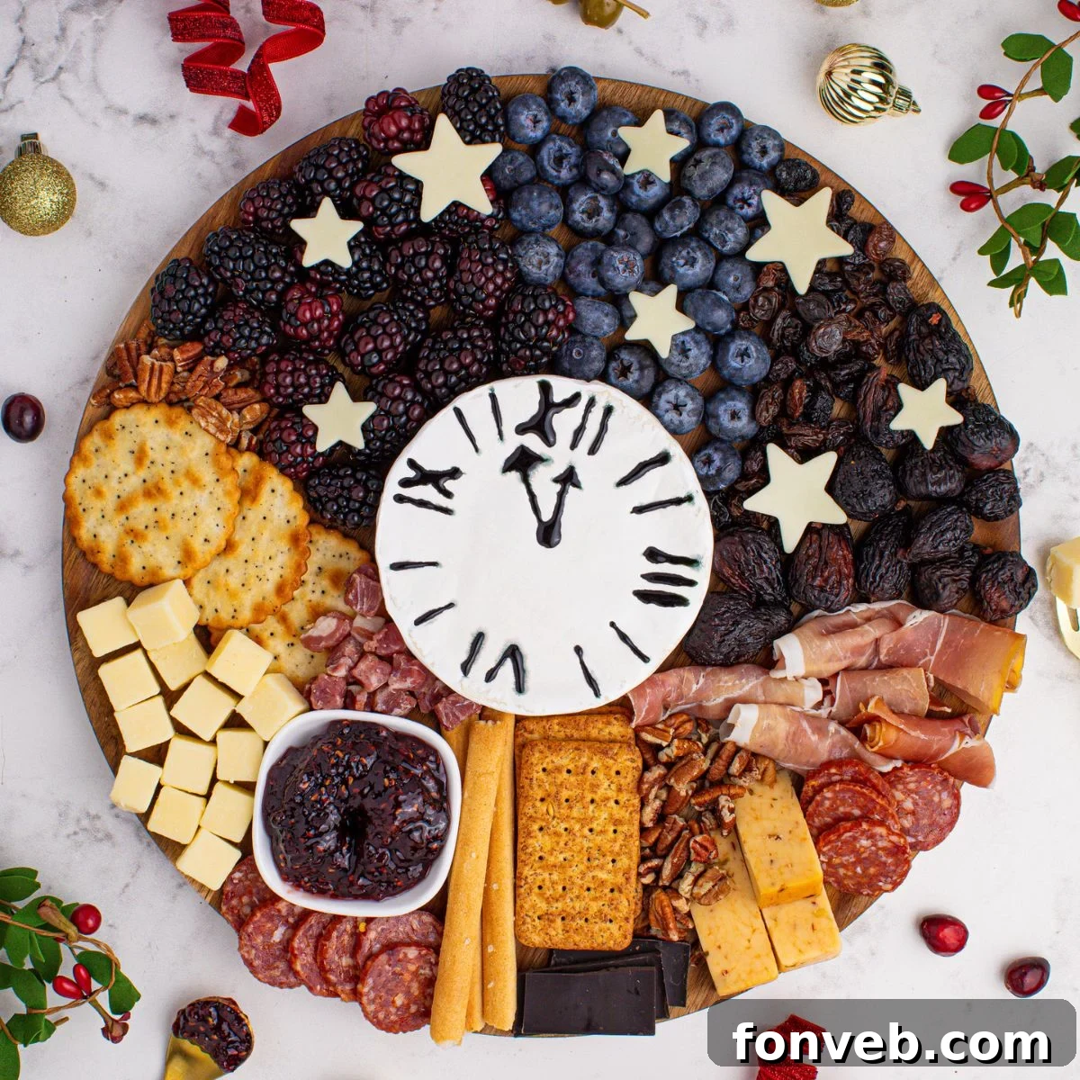 A beautifully arranged New Year's Eve Charcuterie Board set on a table, surrounded by festive garnishments and decor, featuring a variety of cheeses, meats, fruits, and crackers.
