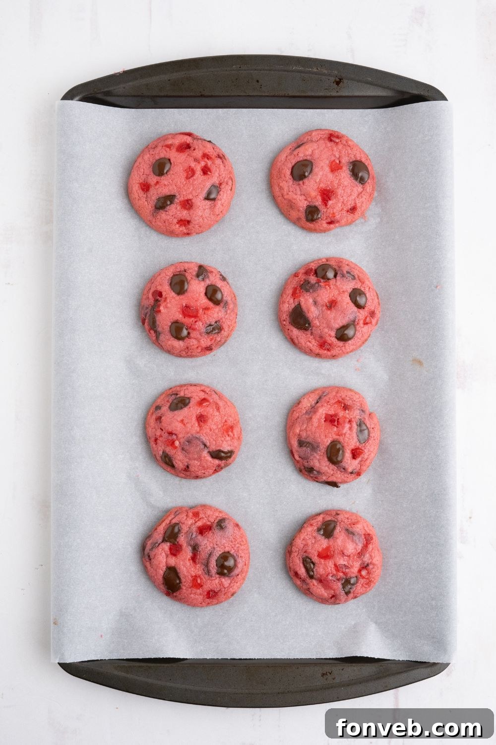 baked Cherry Chocolate Chip Cookies on a cookie sheet