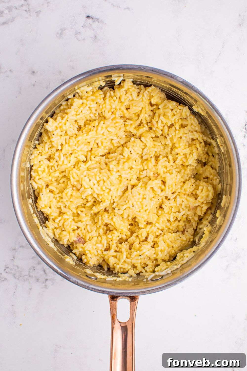 Souper Rice fully cooked and fluffy in a saucepan.