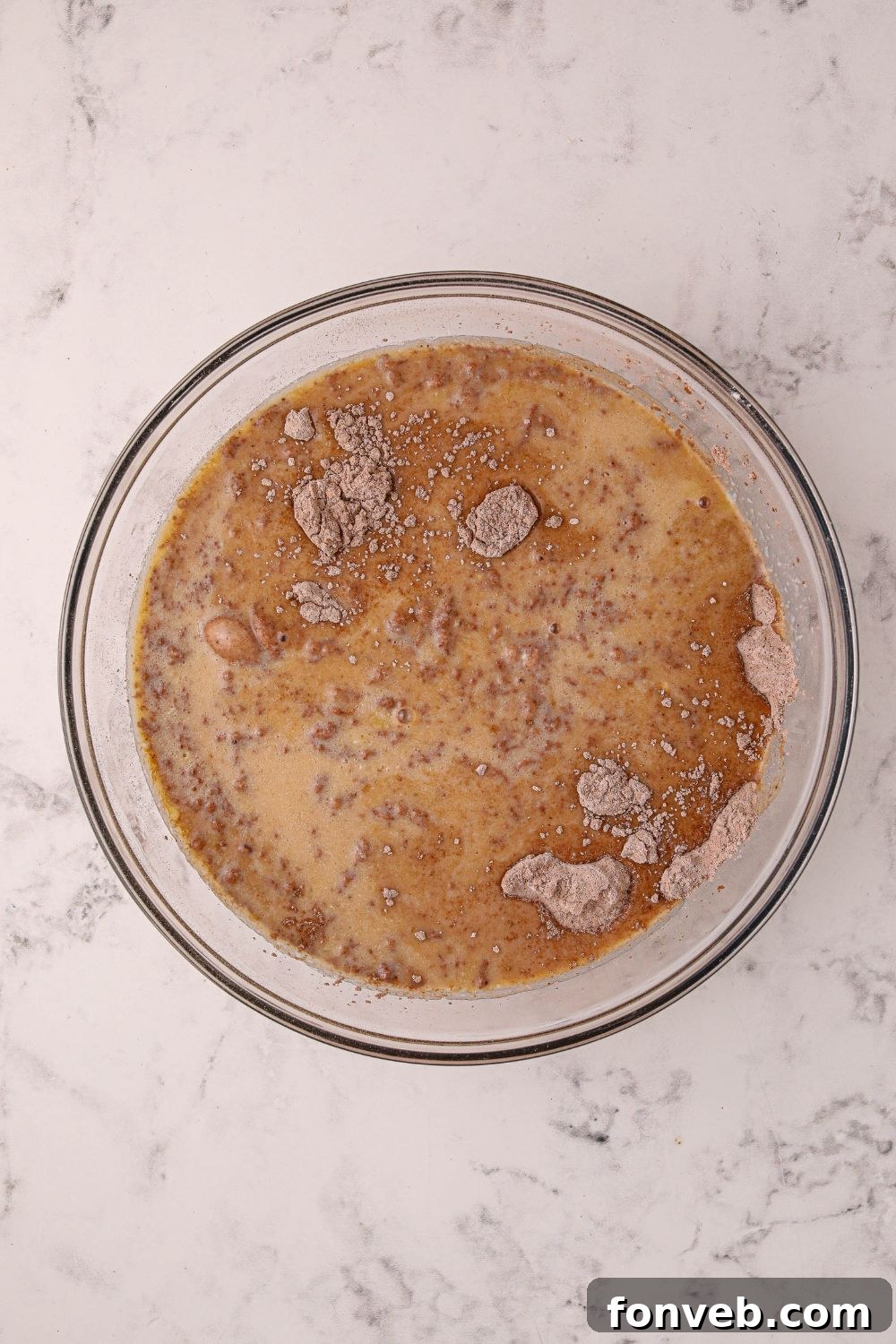 Decadent Hot Chocolate Pancakes 8 ingredients for Hot Chocolate Pancakes in a mixing bowl on table