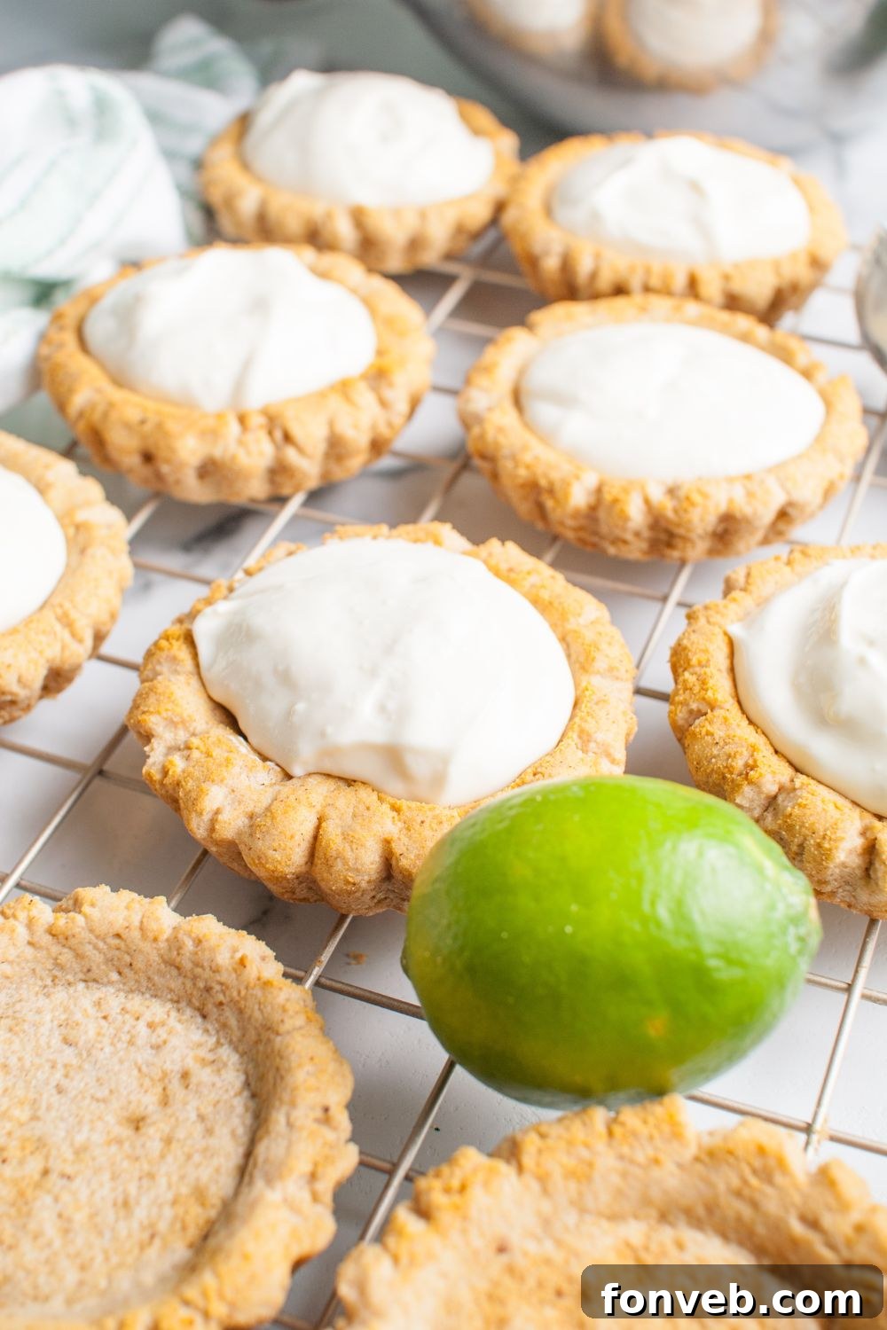 Tangy Key Lime Pie Cookies 14 Crumbl Key Lime Pie Cookies that are filled with key lime pie filling