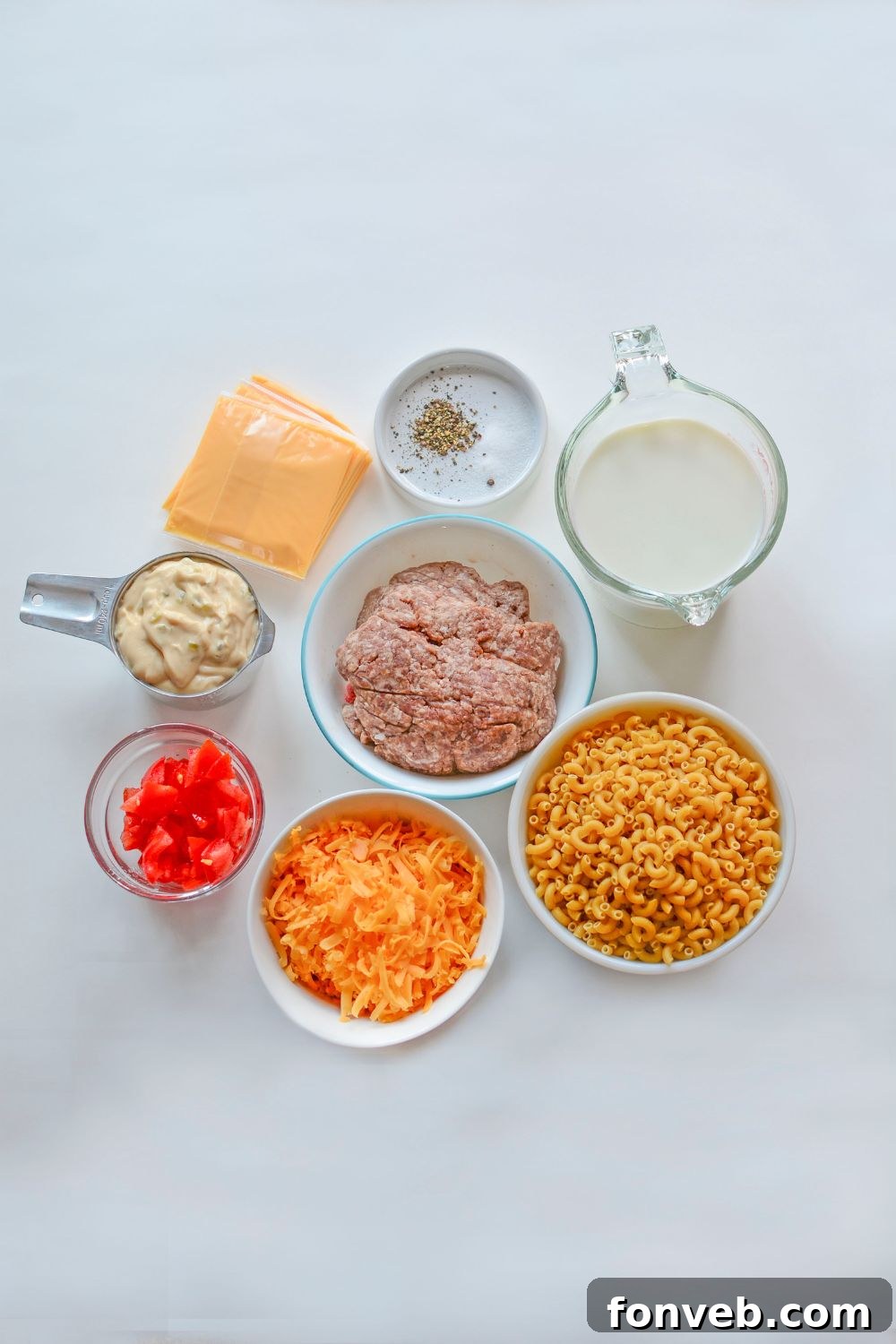 Big Mac Macaroni And Cheese ingredients on table in containers 