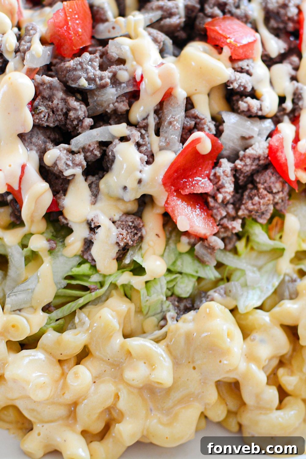 Big Mac Macaroni And Cheese close up view of it on a platter 