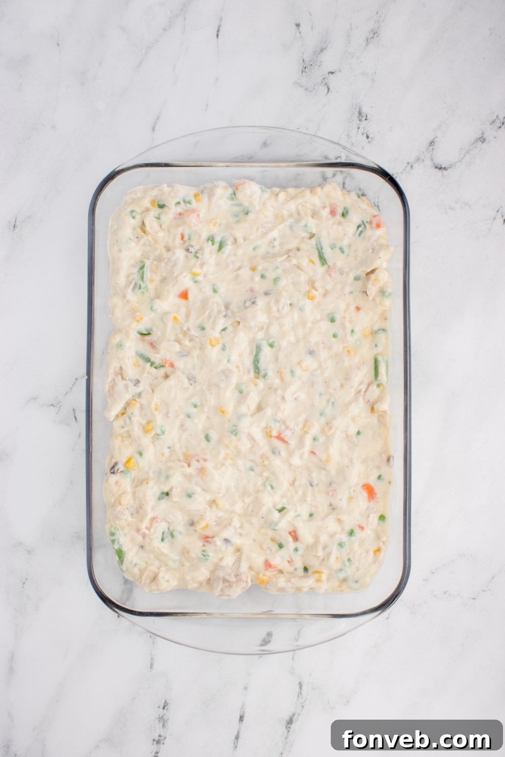 Savory Chicken Stuffing Bake 8 wet Chicken Stuffing Casserole mixture spread evenly in a glass casserole dish