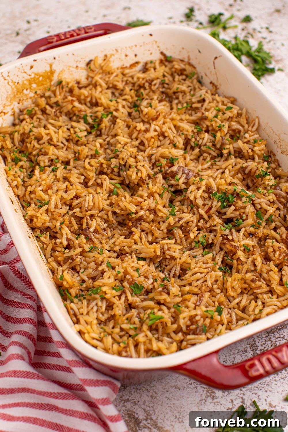 Stick of Butter Rice in a pain on table 