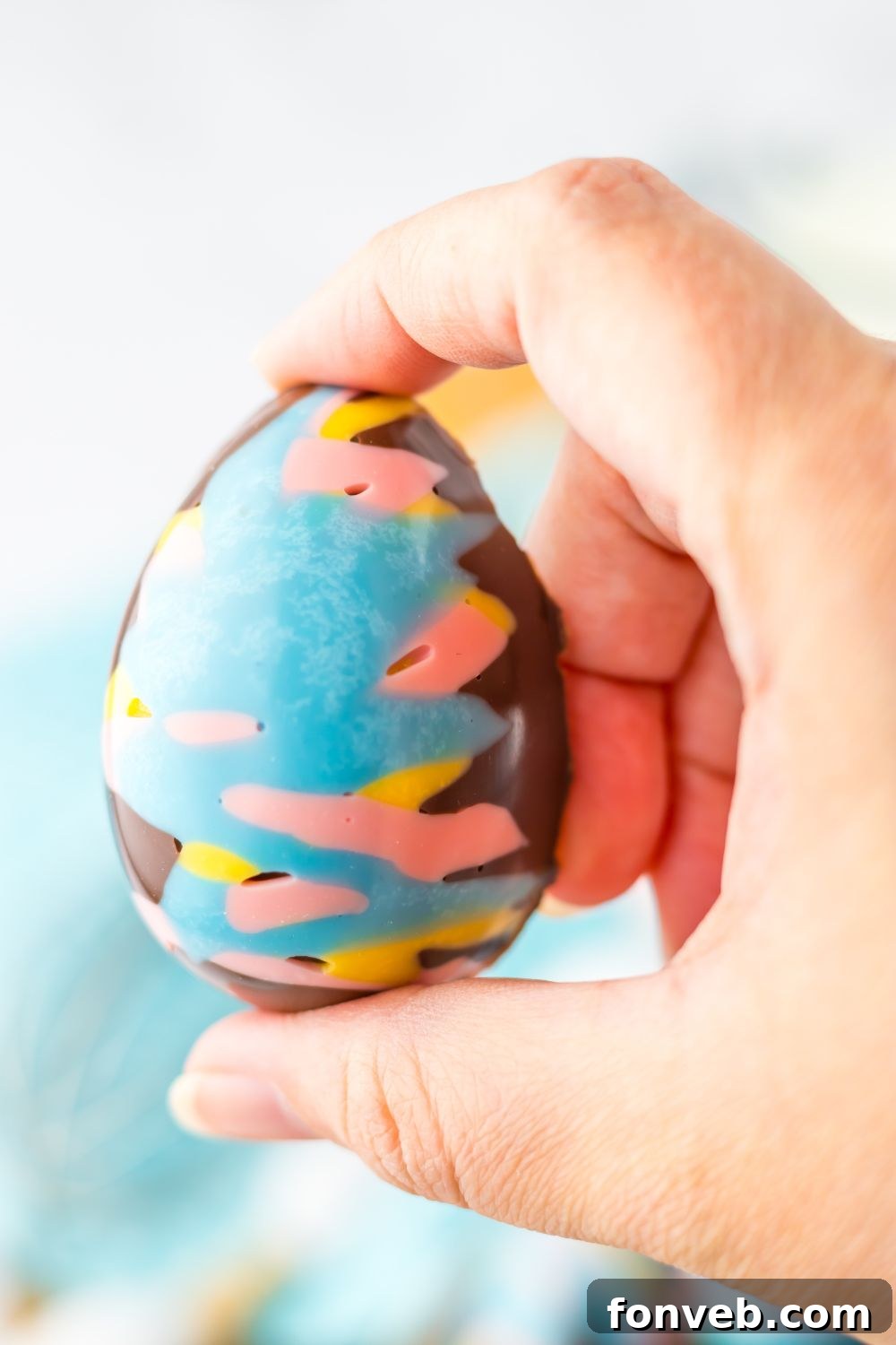 Fluffy Easter Delights 3 Easter Marshmallow Eggs being held in hand