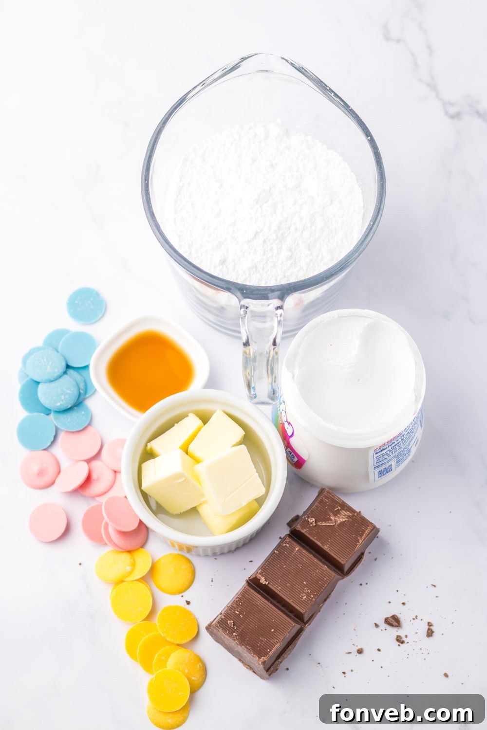 Fluffy Easter Delights 4 Easter Marshmallow Egg ingredients on marble table