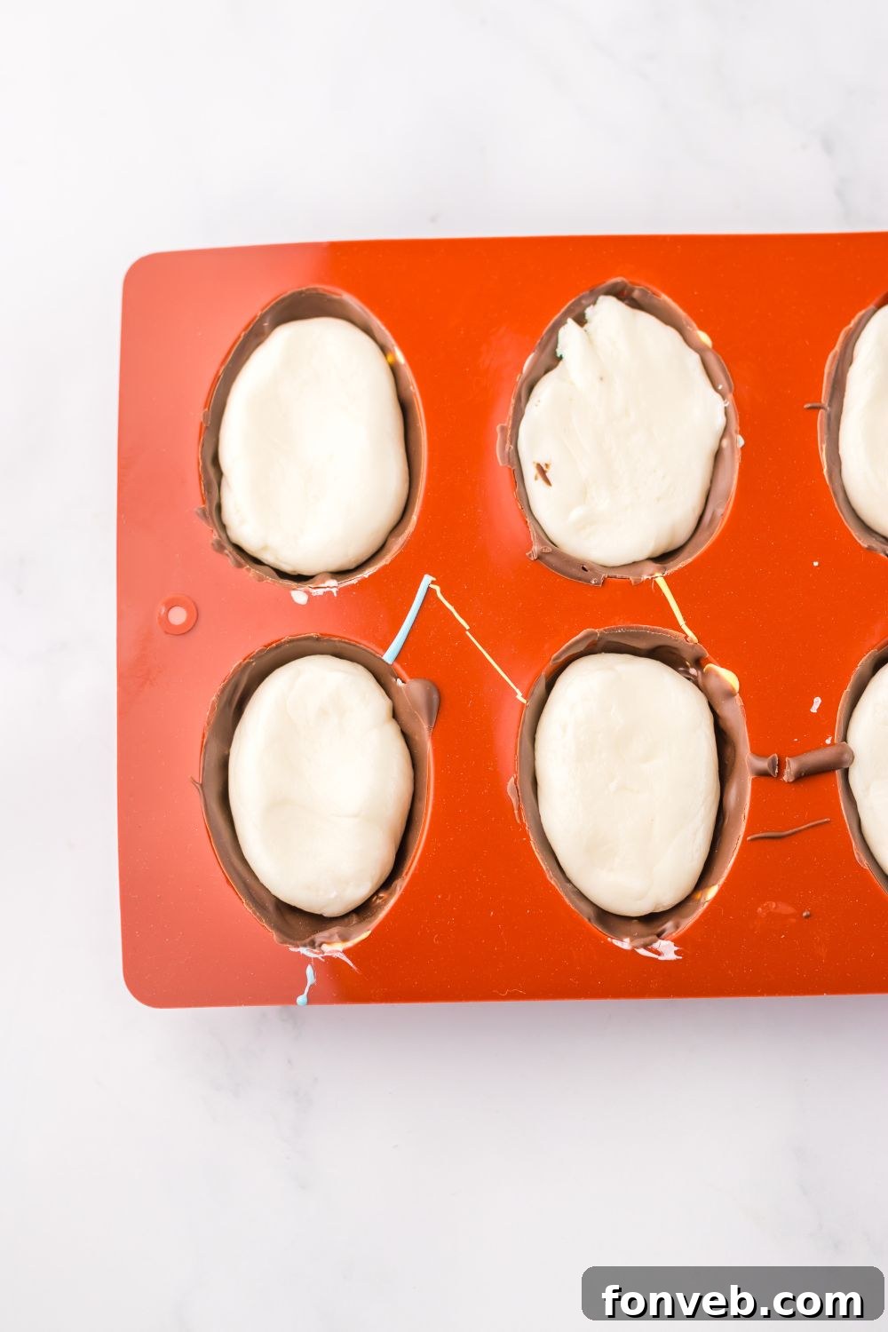 Fluffy Easter Delights 7 Easter Marshmallow Eggs being assembled in a silicone mold