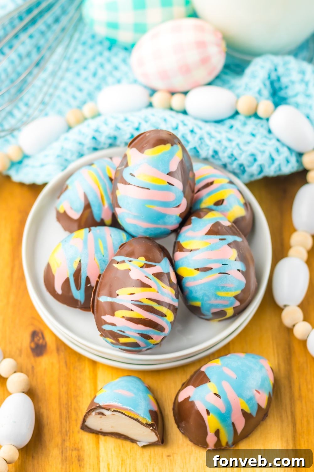 Fluffy Easter Delights 8 Easter Marshmallow Eggs on a plate with Easter decor around it