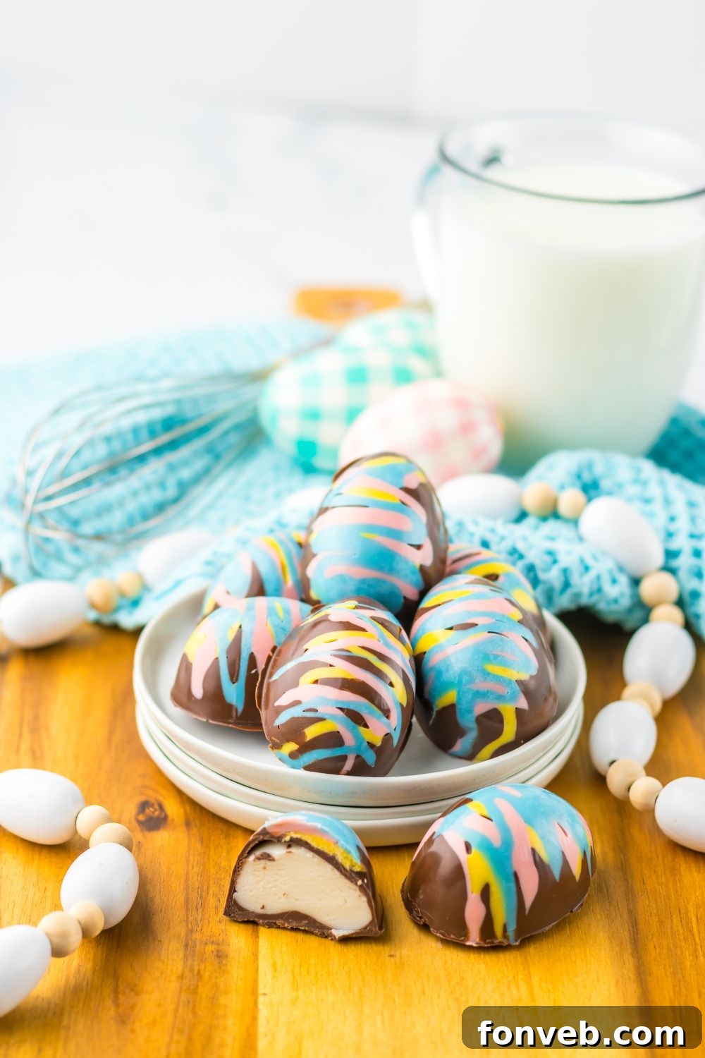 Fluffy Easter Delights 9 Easter Marshmallow Eggs in a tray with an egg sliced in half