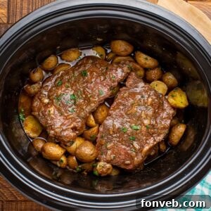 Crock Pot Steak and Potatoes in a crock pot on table