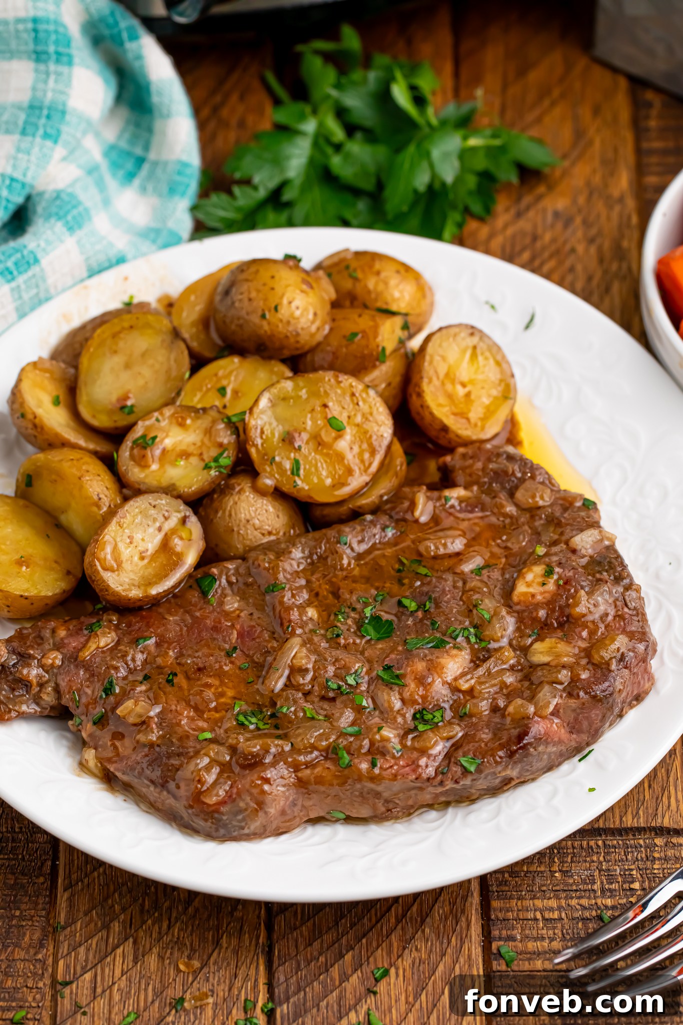 A plate of perfectly cooked Crock Pot Steak and Potatoes, ready to be enjoyed