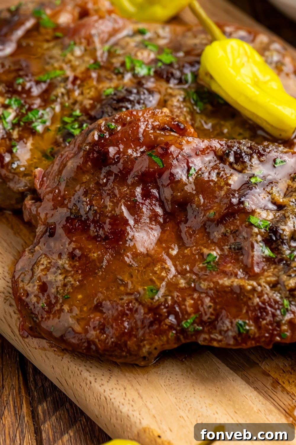 Mississippi Ribeye Steaks on a wooden cuting board on table