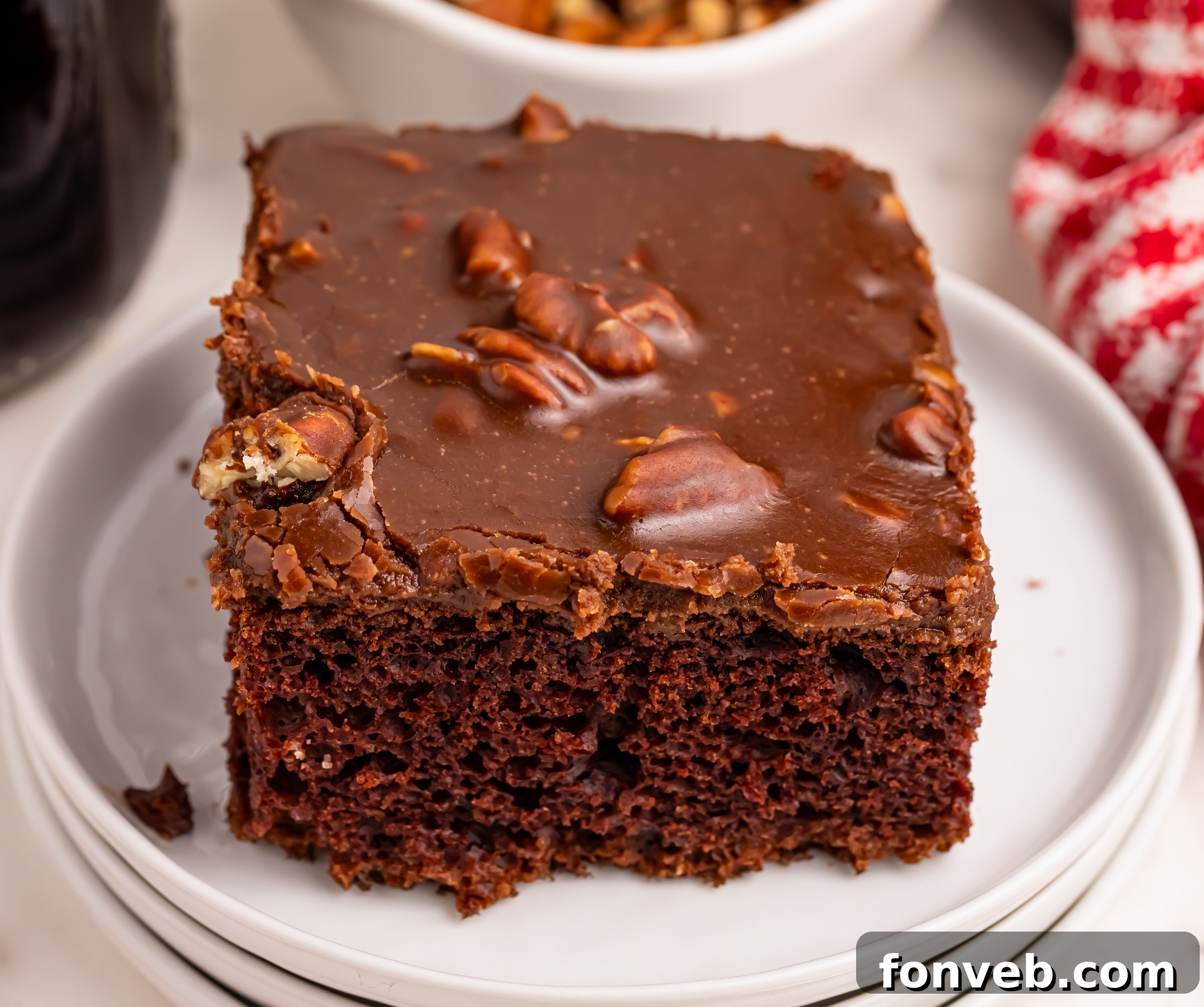 Classic Dr. Pepper Cake 15 A detailed close-up of a Dr. Pepper Cake, showing the fine, moist texture of the chocolate cake and the smooth, rich glaze coating.