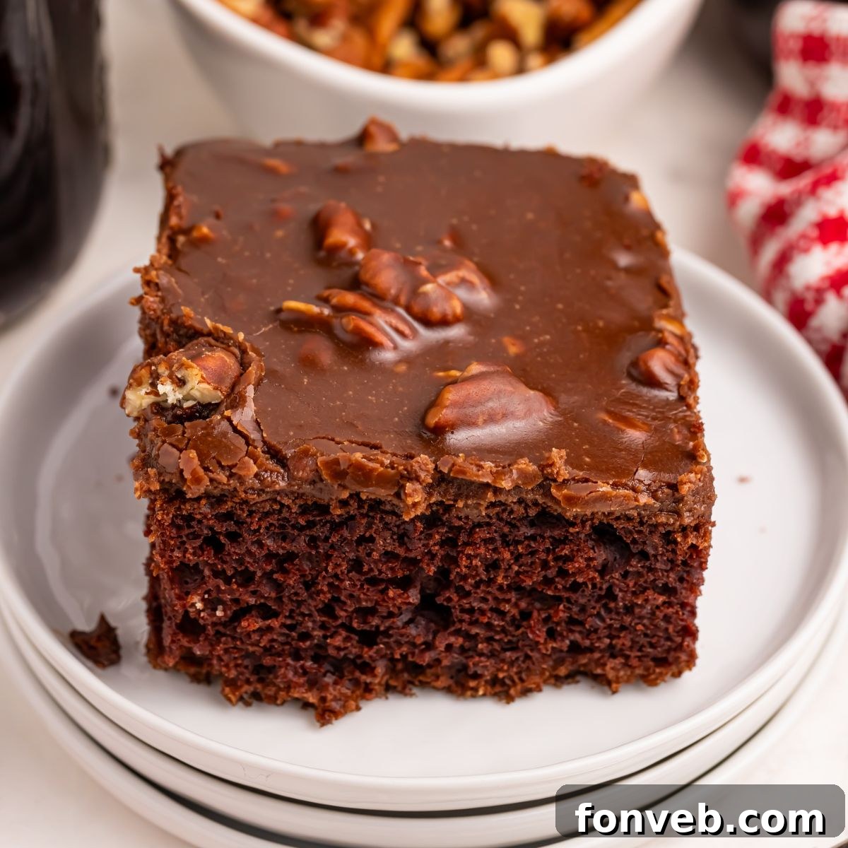 Classic Dr. Pepper Cake 3 Several slices of freshly baked Dr. Pepper Cake arranged neatly on a serving plate, showcasing the rich chocolate color and inviting texture.