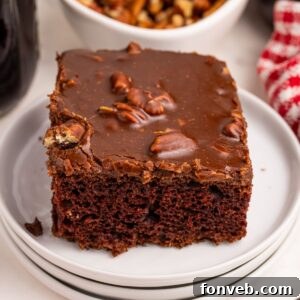 Dr. Pepper Cake sliced on plate