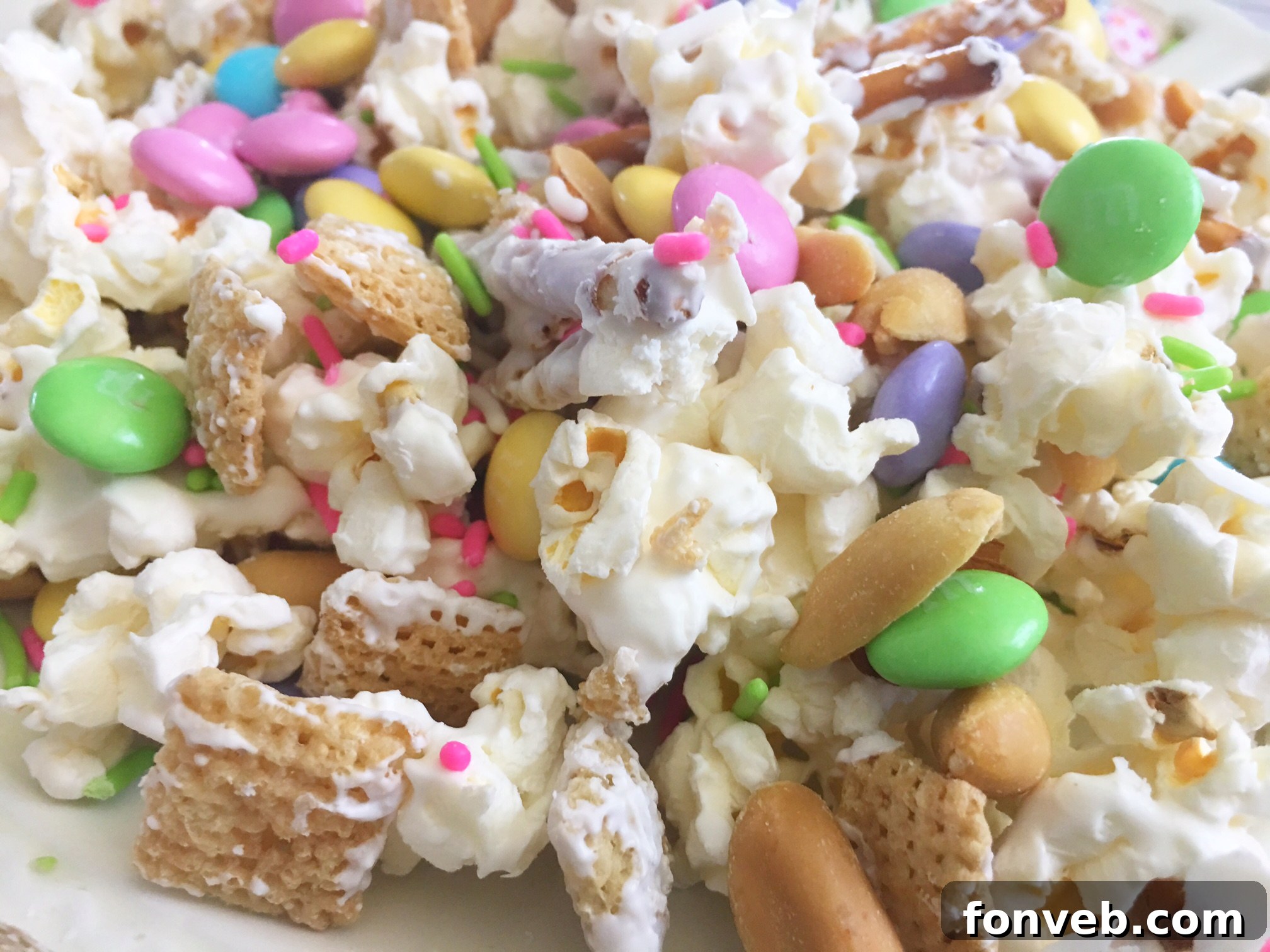 Individual portions of Bunny Bait Easter Crack packaged in clear bags with colorful ribbons, ready for gifting