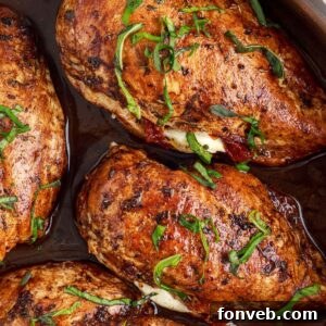Caprese Stuffed Chicken in a skillet