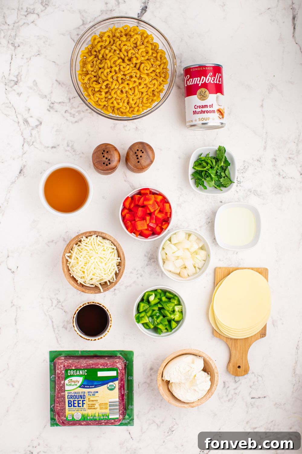 Creamy Philly Cheesesteak Pasta 4 ingredients for Philly Cheesesteak Pasta on table in single serving bowls