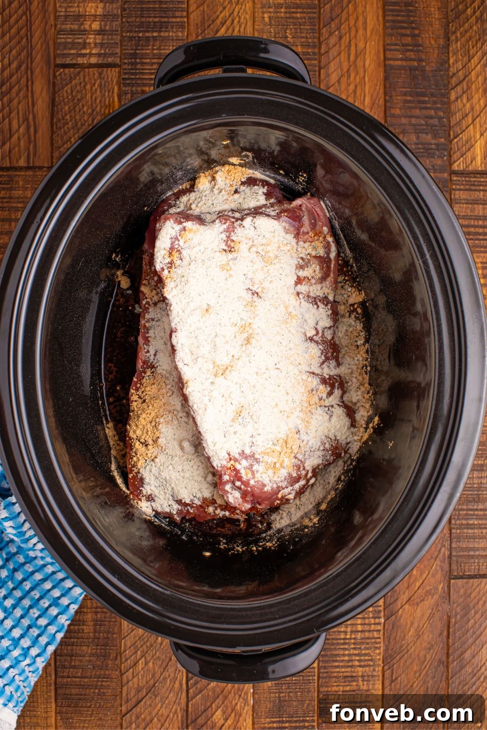 overhead look of cooked Slow Cooker Mississippi Ribs in slow cooker