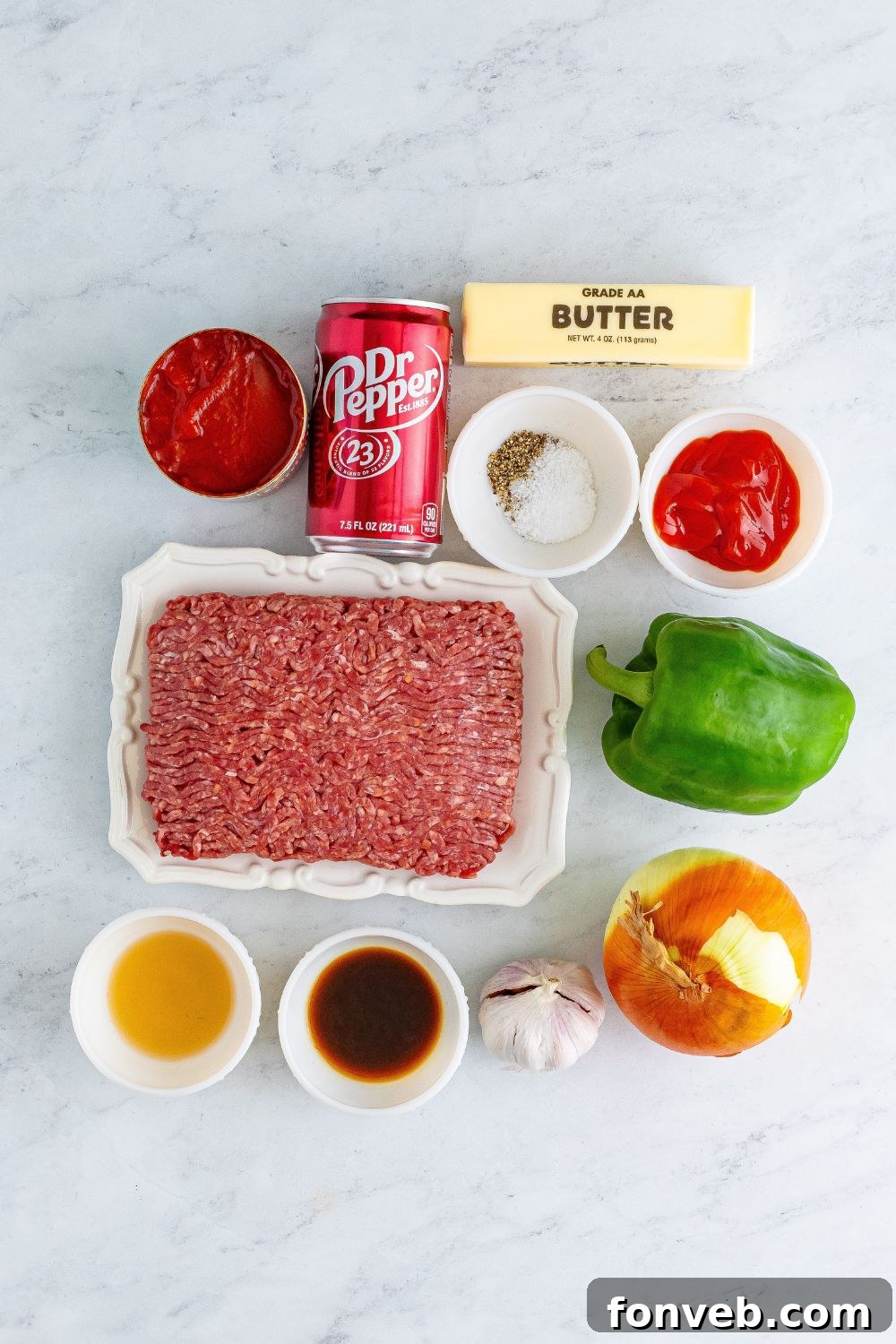 marble counter with all the ingredients for sloppy joes spread out