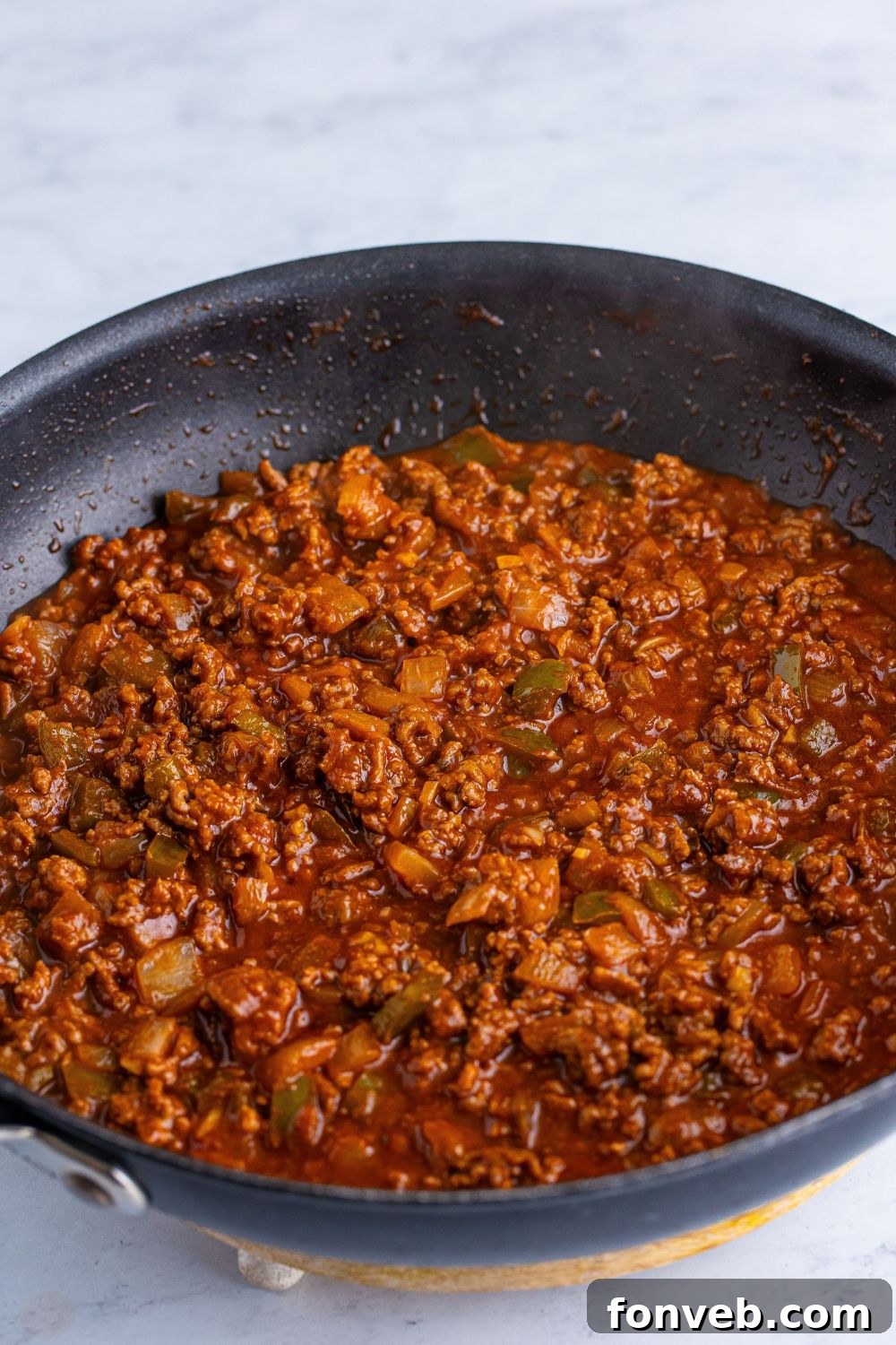 Dr. Pepper Sloppy Joes mixture in a skillet on table 
