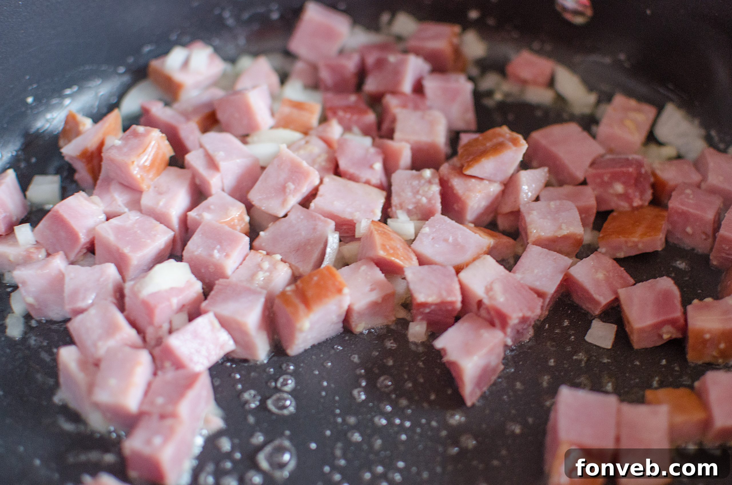 Overhead shot of Haluski in a large serving dish, showcasing its appealing texture and generous portions.