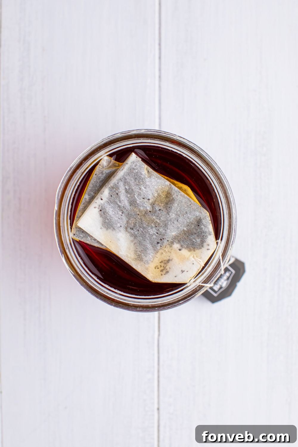 tea bag in a glass on table